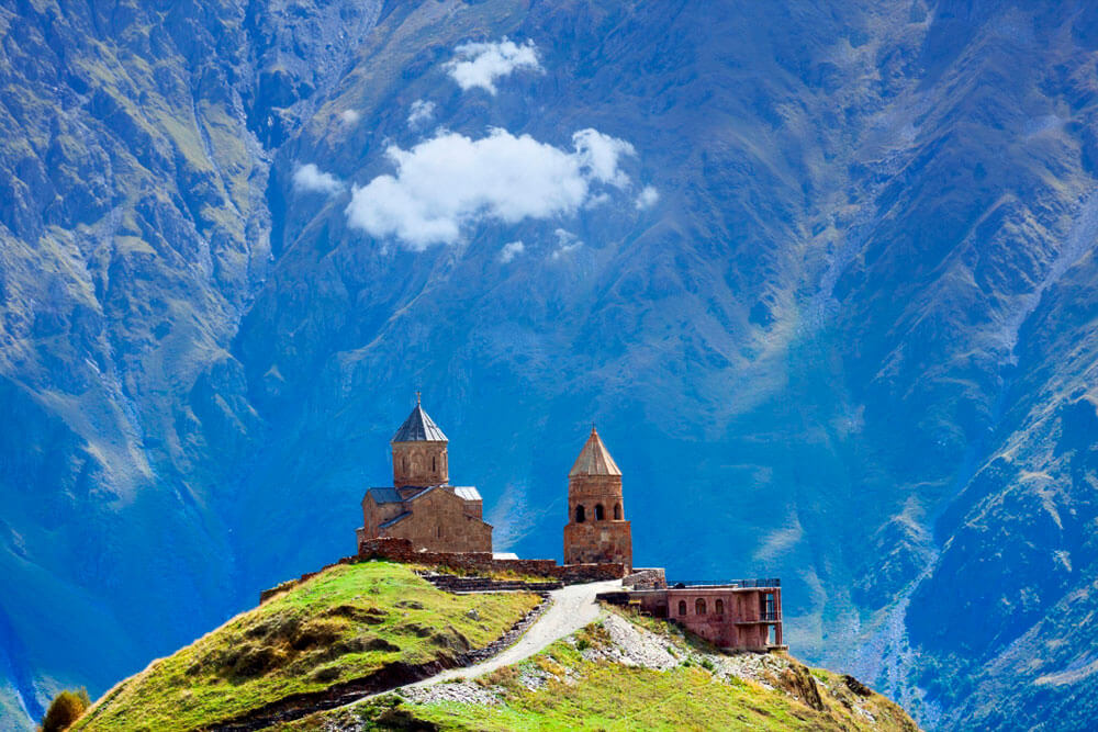 Kazbegi mountains and Gergeti Trinity Church